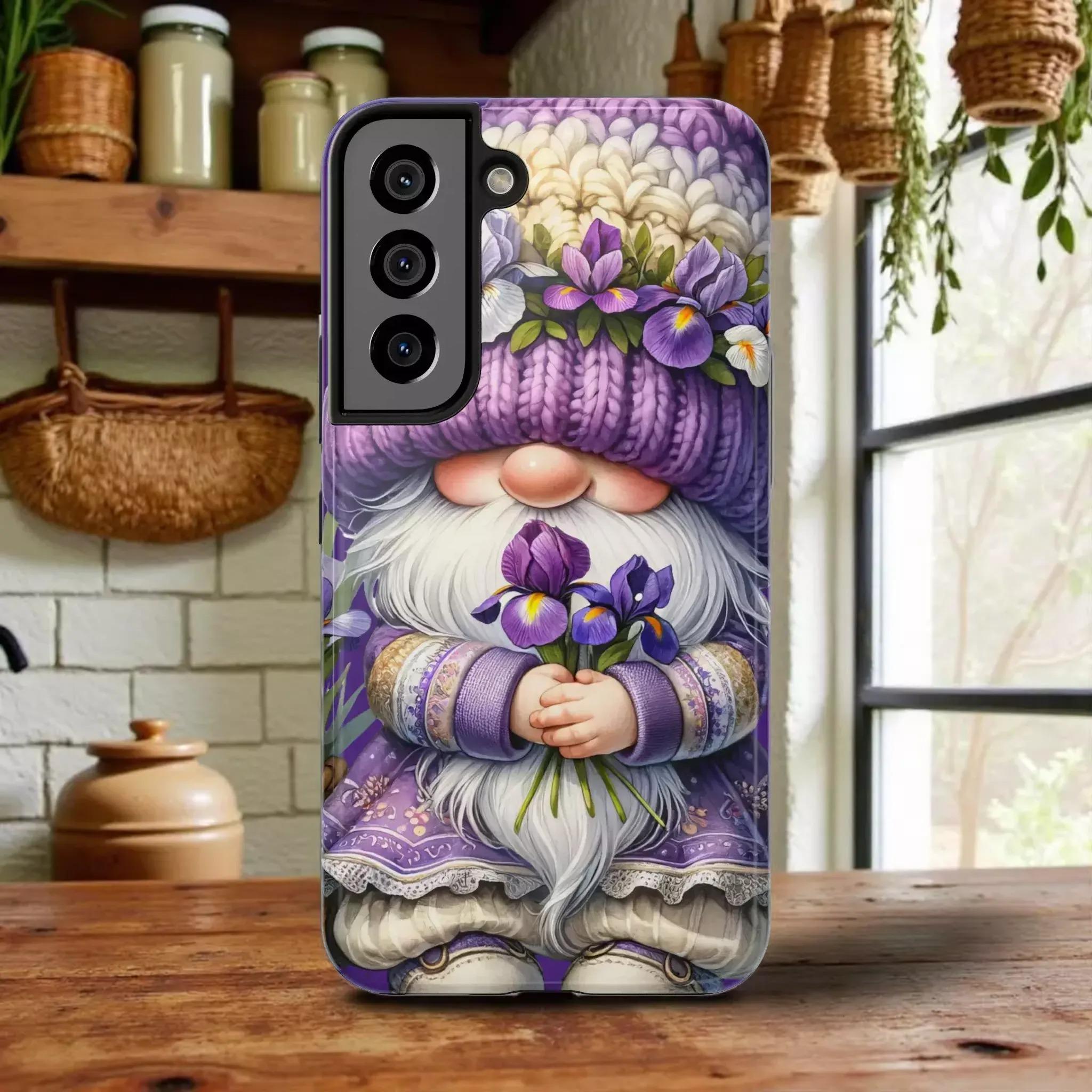 A phone case featuring a whimsical illustration of a gnome holding flowers, with a purple and white color scheme.
