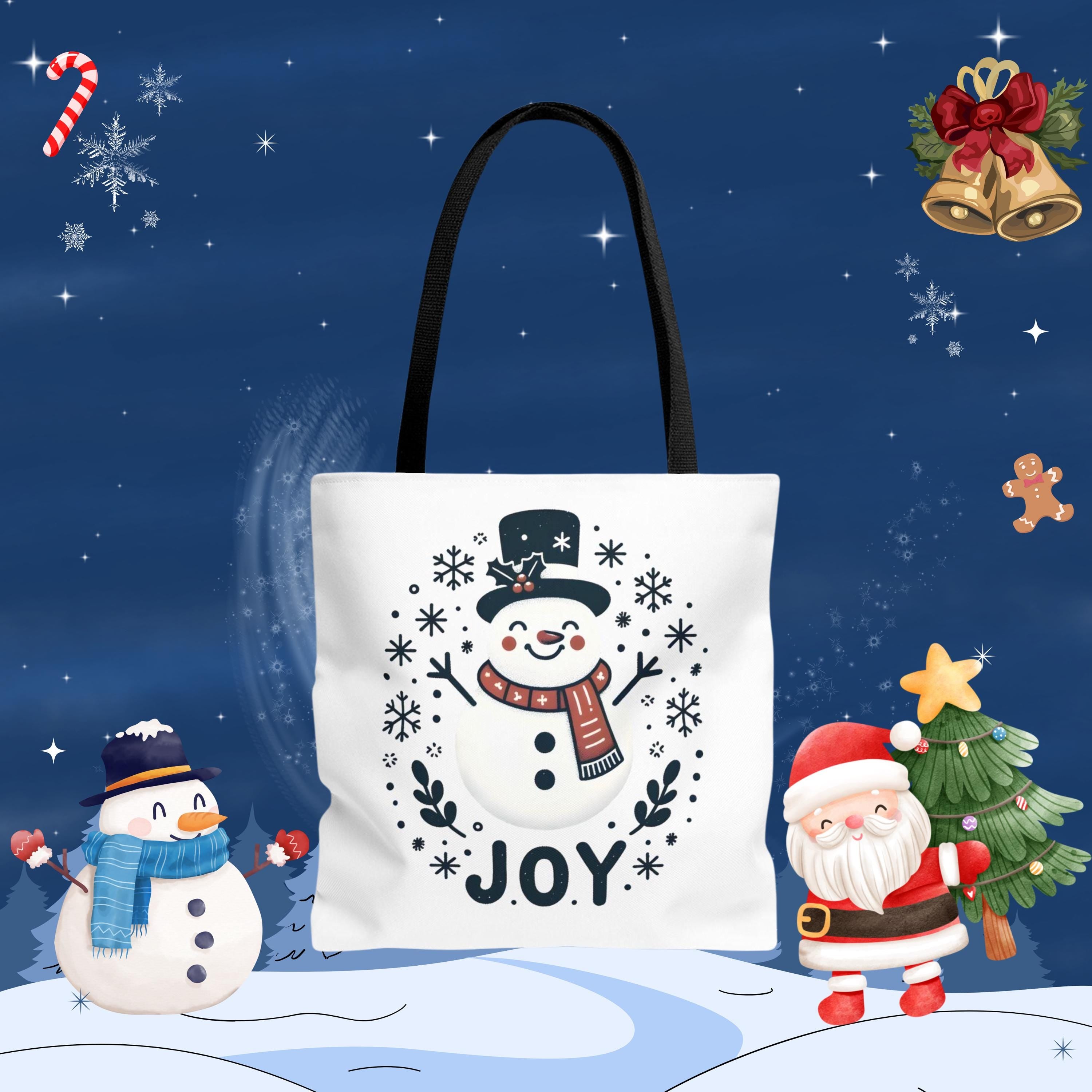 A white tote bag with a snowman and Santa Claus illustration, surrounded by festive holiday decorations such as snowflakes, bells, and a star.