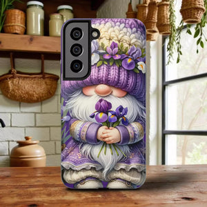 A phone case featuring a whimsical illustration of a gnome holding flowers, with a purple and white color scheme.