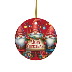A red ornament with three smiling gnomes holding a sign that says "Merry Christmas".
