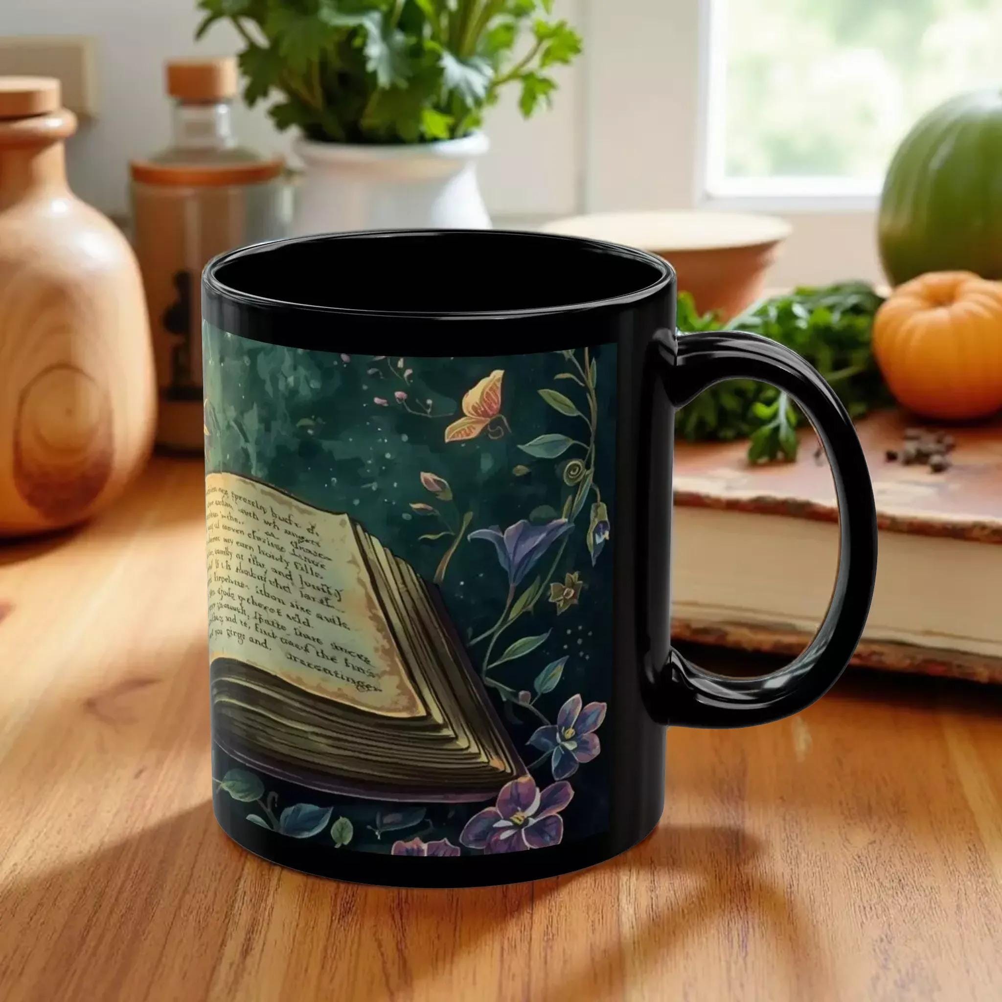 A black mug with an open book and colorful flowers printed on it.