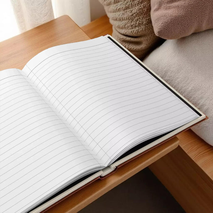 The image is a book cover with a stack of books, a cup of coffee, and a plant.