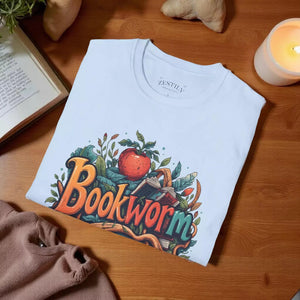 A light blue t-shirt with a colorful graphic design featuring the text "Bookworm" surrounded by various elements such as leaves, an apple, and a book.