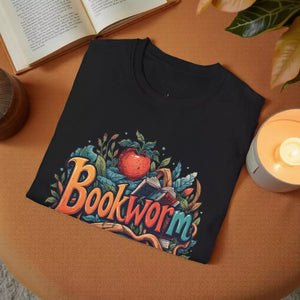 The image is a black t-shirt with a colorful graphic design featuring the word "Bookworm" surrounded by various elements such as leaves, an apple, and a book.