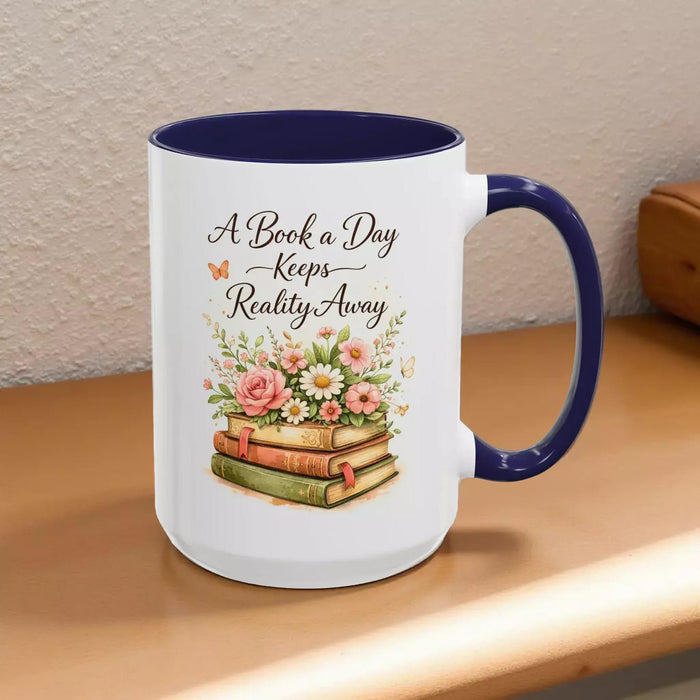 A white mug with a black handle, featuring a design of a stack of books with flowers on top.