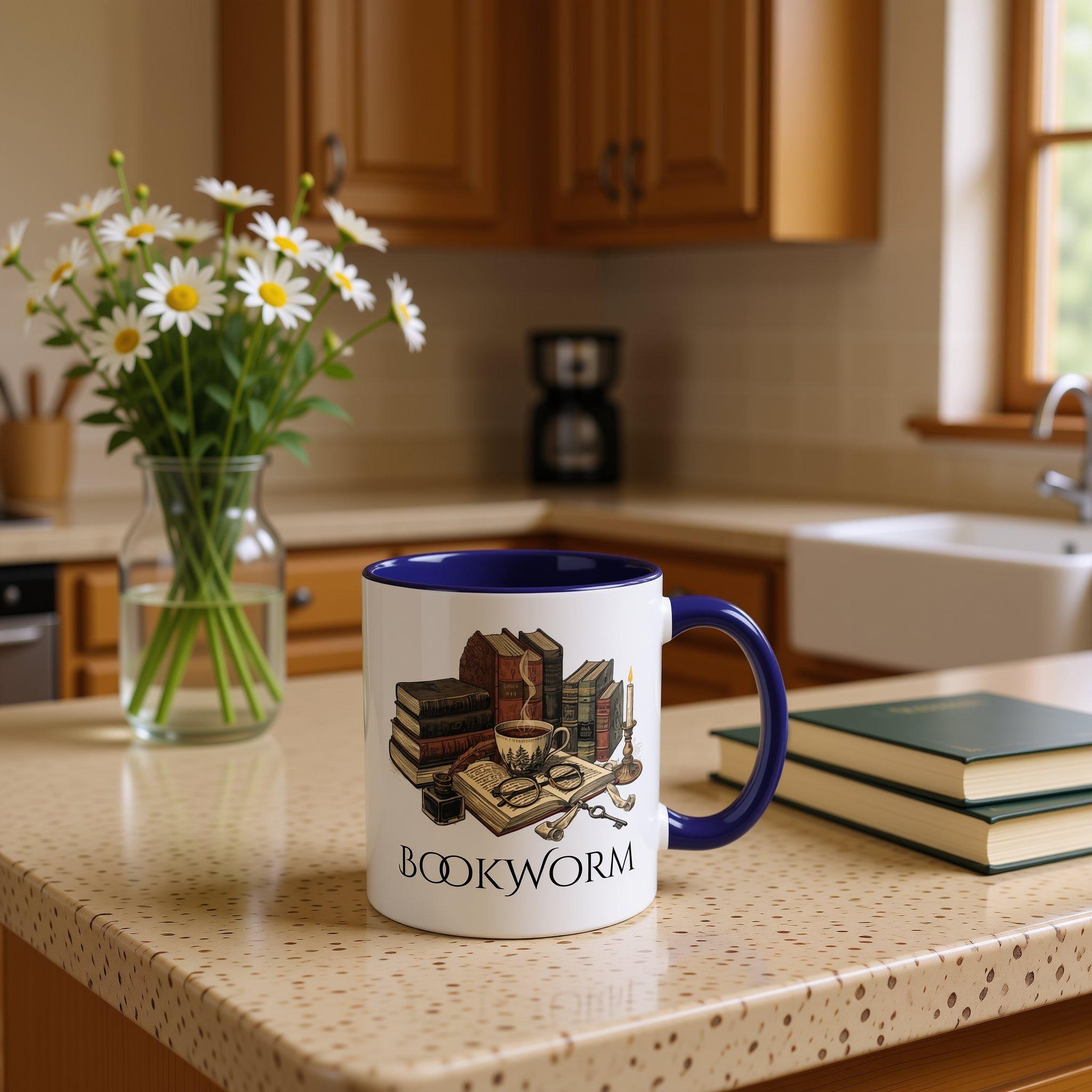A white mug with a blue rim, featuring an illustration of a bookworm surrounded by various books, a cup of coffee, and other objects associated with reading and studying.