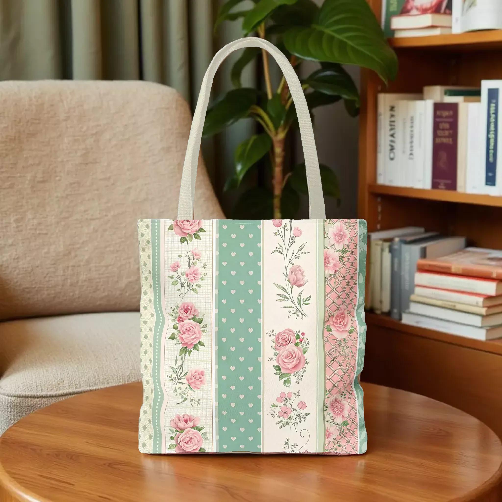 A tote bag with a floral pattern in shades of green, pink, and white.