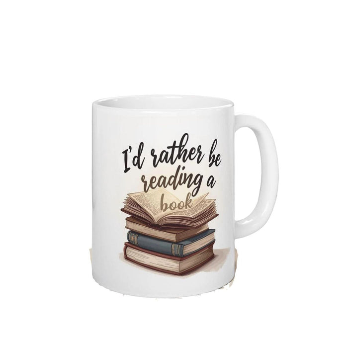 A beige tote bag with a printed design on it, depicting a stack of books. The text on the bag reads "I'd rather be reading a book".