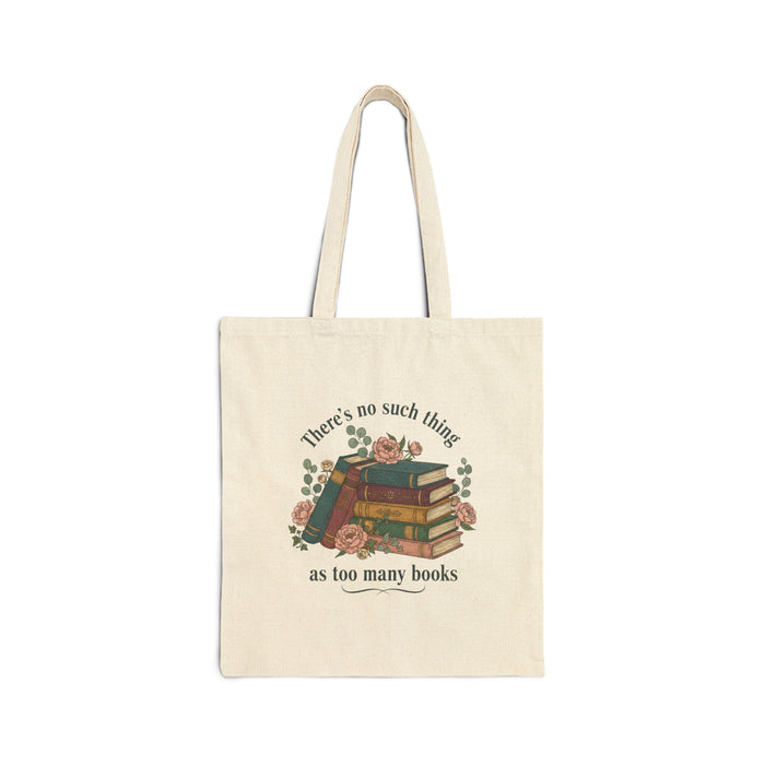 a tote bag and a mug with a printed design, including a stack of books and the text "There's no such thing as too many books" and "There's no such thing as too many books" on them. The items are placed on a table with some greenery, and there is a text overlay that reads "Tote Bag & Mug Gift Set" and "Buy the Tote & add the Mug".