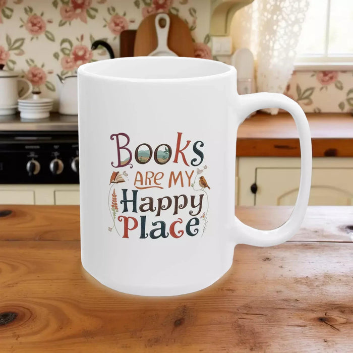 A tote bag and a mug with the text "Books are my Happy Place" printed on them, along with a book and a pen.