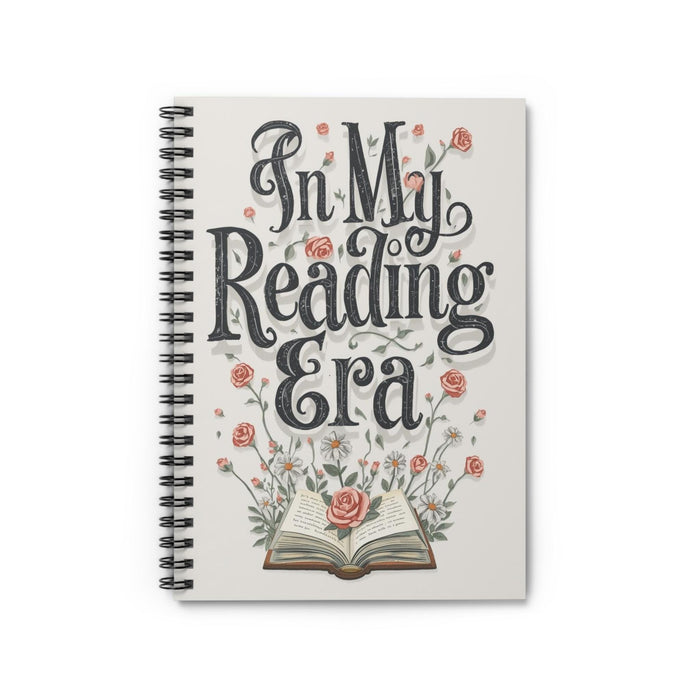 The image is a book cover for a reading journal with a floral design and an open book illustration.