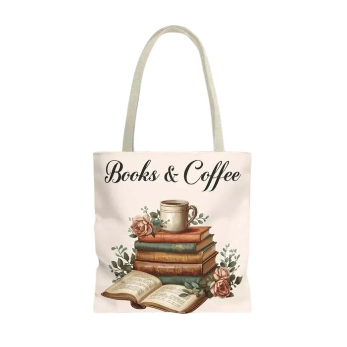 A white tote bag with a printed design of a stack of books and a cup of coffee, placed on a wooden table in a living room setting.