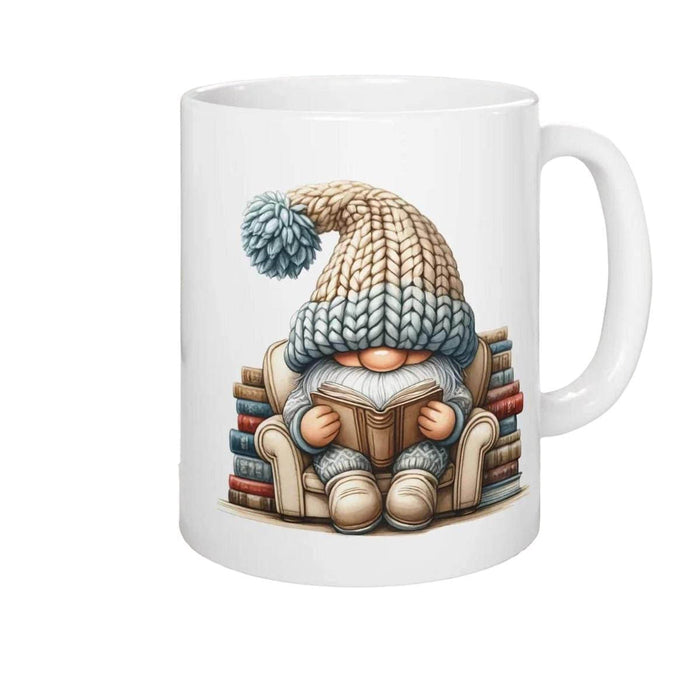 a tote bag and a mug with a gnome sitting on a stack of books, both with a knitted hat on.